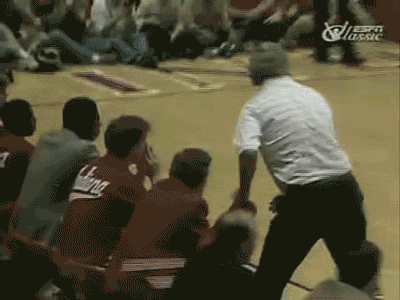 Indiana-University-Head-Coach-Bob-Knight-Throws-Chair-On-Court